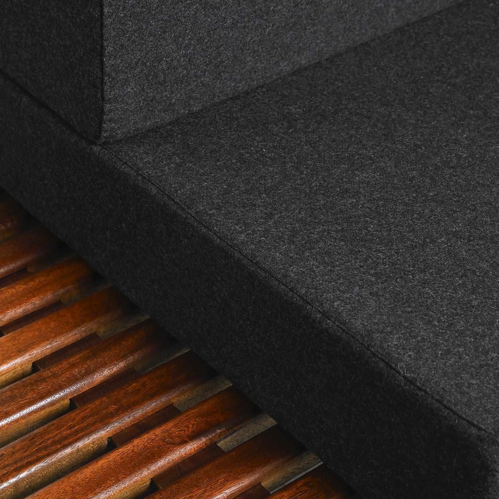 Cansado mahogany bench by Charlotte Perriand, circa 1962.