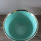 Green and gold cup from the Moi Salins collection.