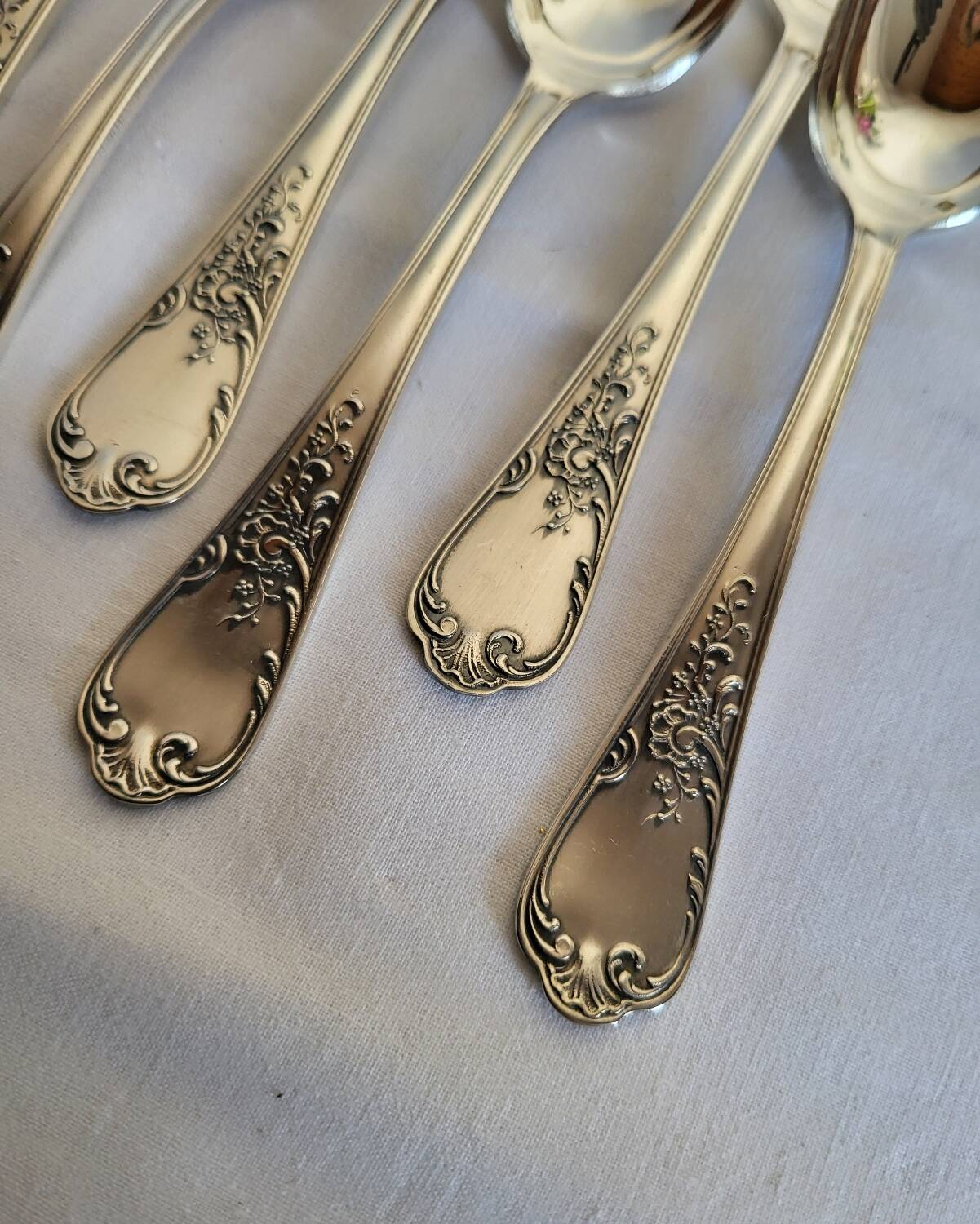 12 small silver-plated metal spoons by Guildart