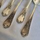 12 small silver-plated metal spoons by Guildart