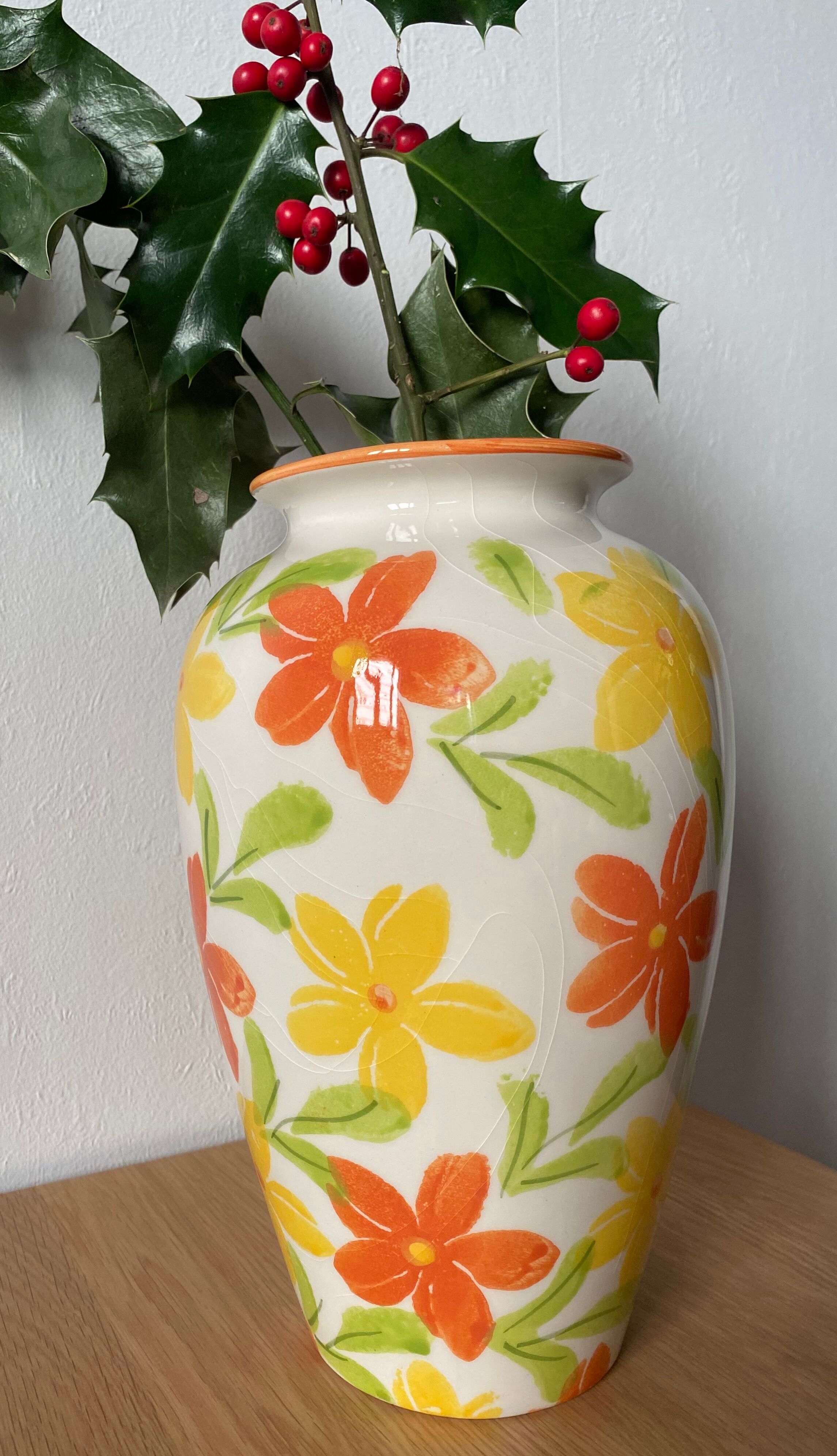 White vase with flowers