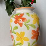 White vase with flowers