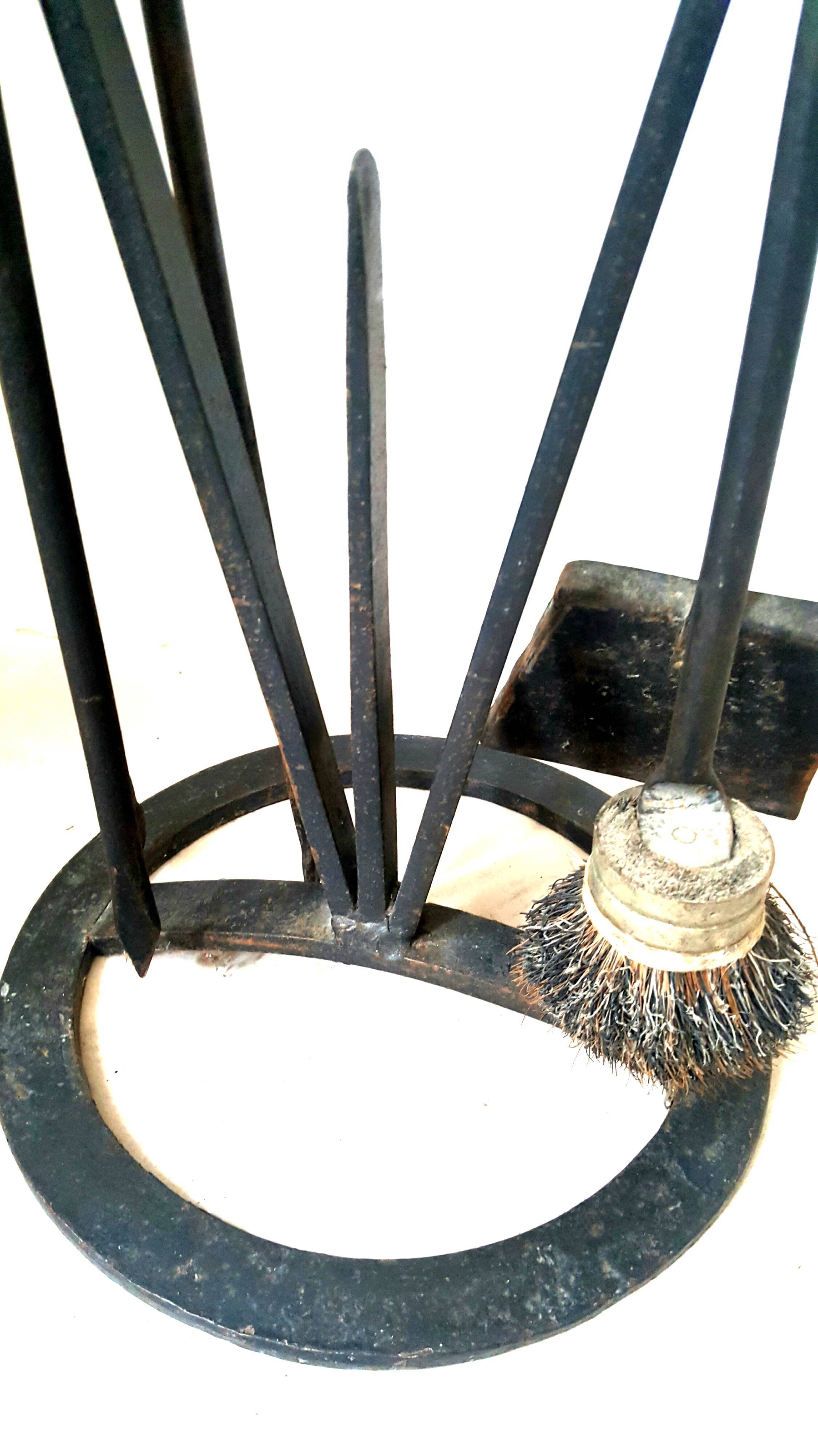 Forged iron chimney necessities circa 1950