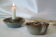 Pair of cellar rat candle holders in glazed sandstone