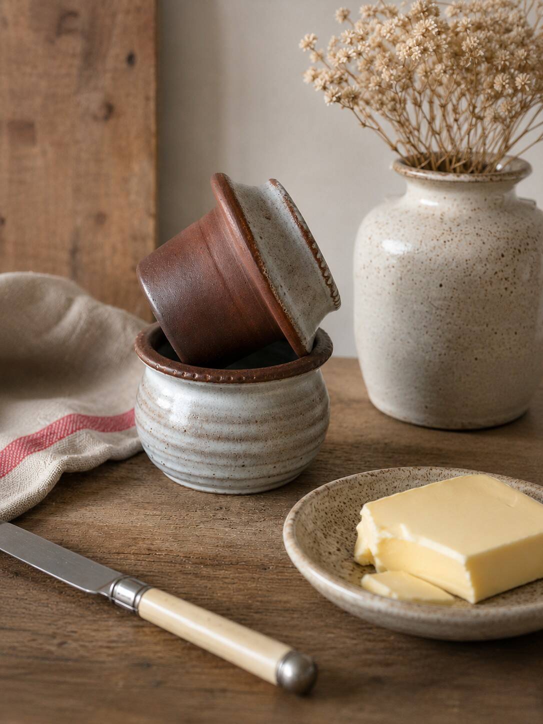 Small water butter dish in glazed stoneware in the Ratilly style.