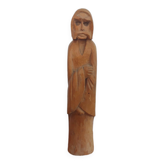 Wooden statue of a monk