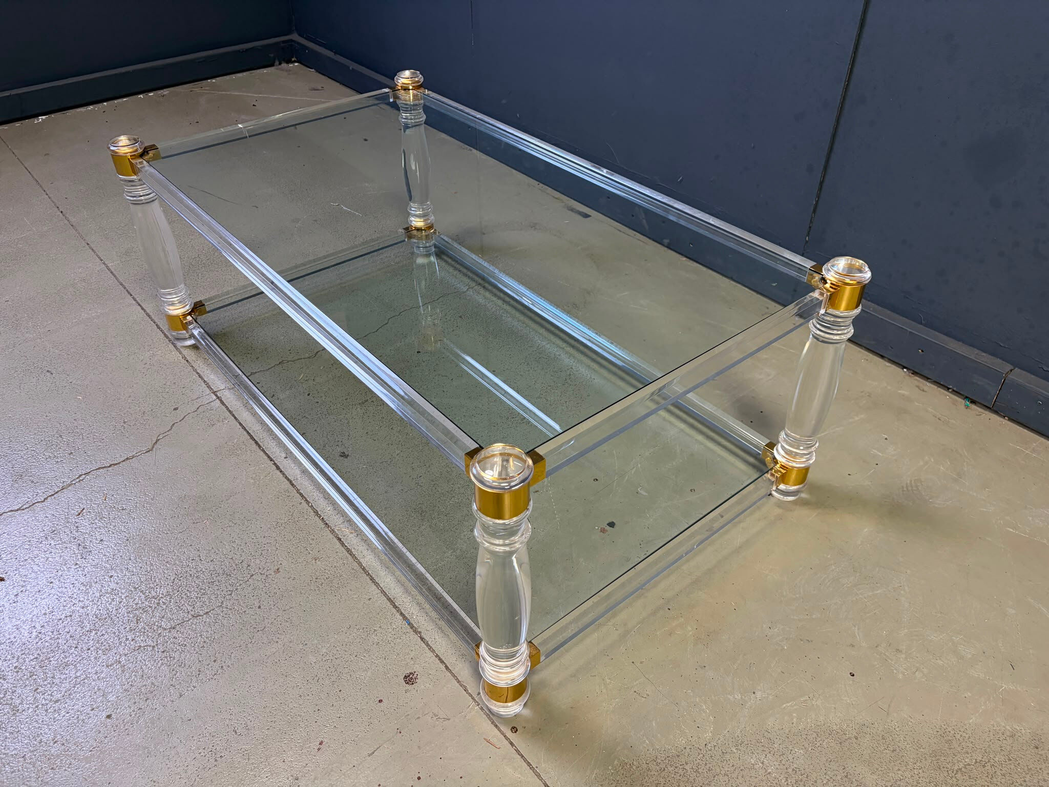 Vintage lucite and brass coffee table, 1970s