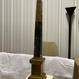 Obelisk stone brass base