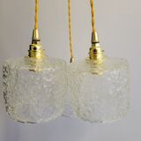 Trio of scrambled glass pendant lamps