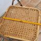 Pair of vintage metal and cane folding chairs