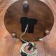 Brutalist floor lamp in turned wood, in the style of Charles Dudouyt.