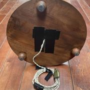 Brutalist floor lamp in turned wood, in the style of Charles Dudouyt.