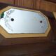 Vintage Art Deco wall coat rack in two-tone wood with engraved mirror.