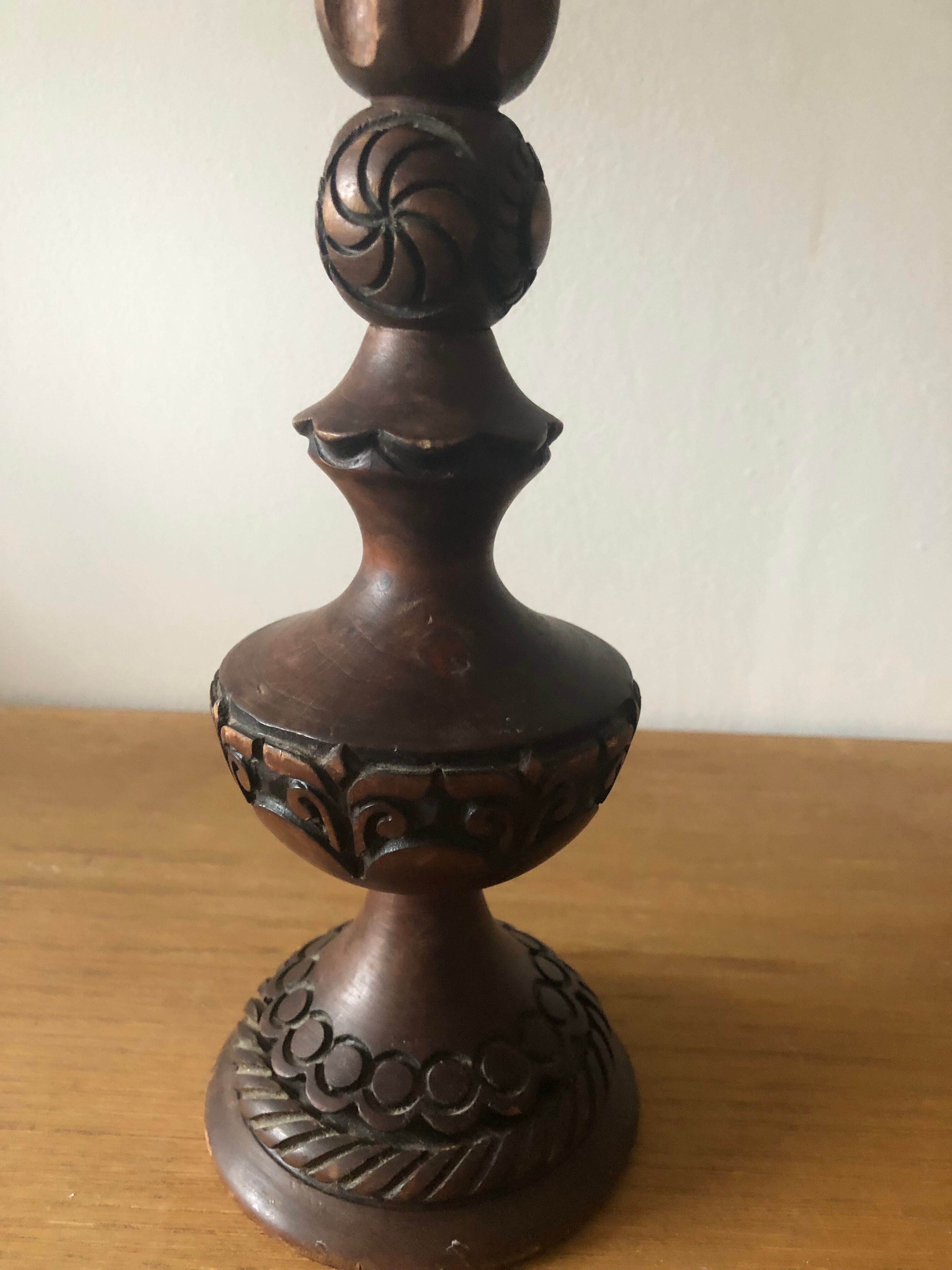 Carved wooden candle holder