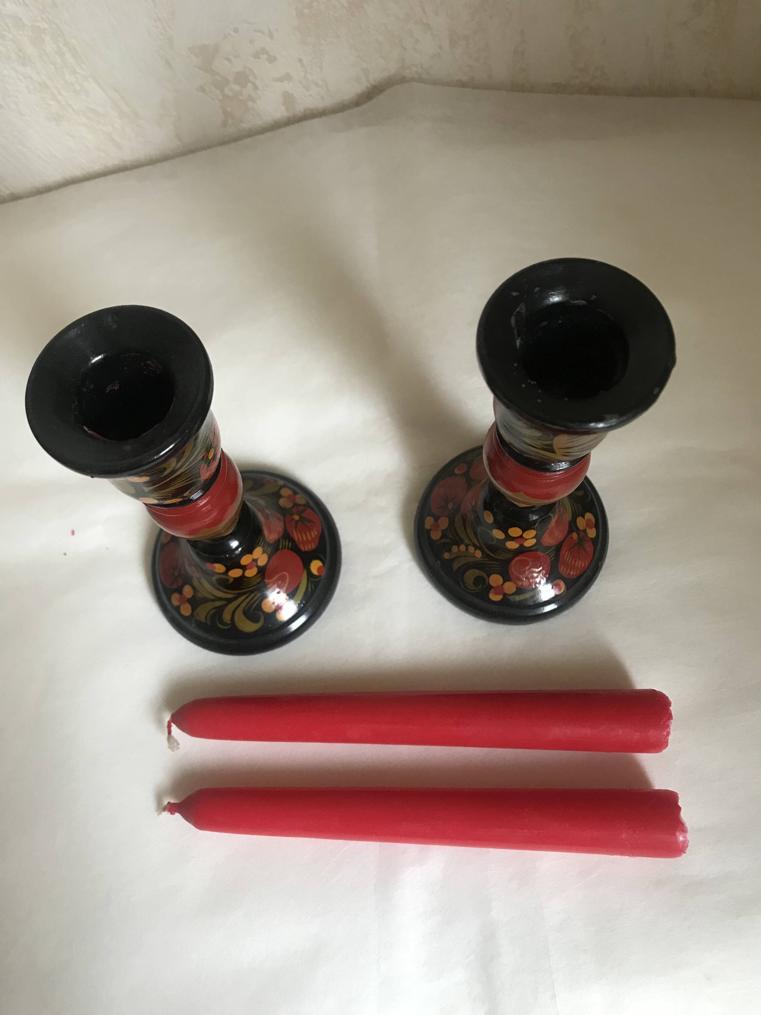 Varnished wooden candle holders