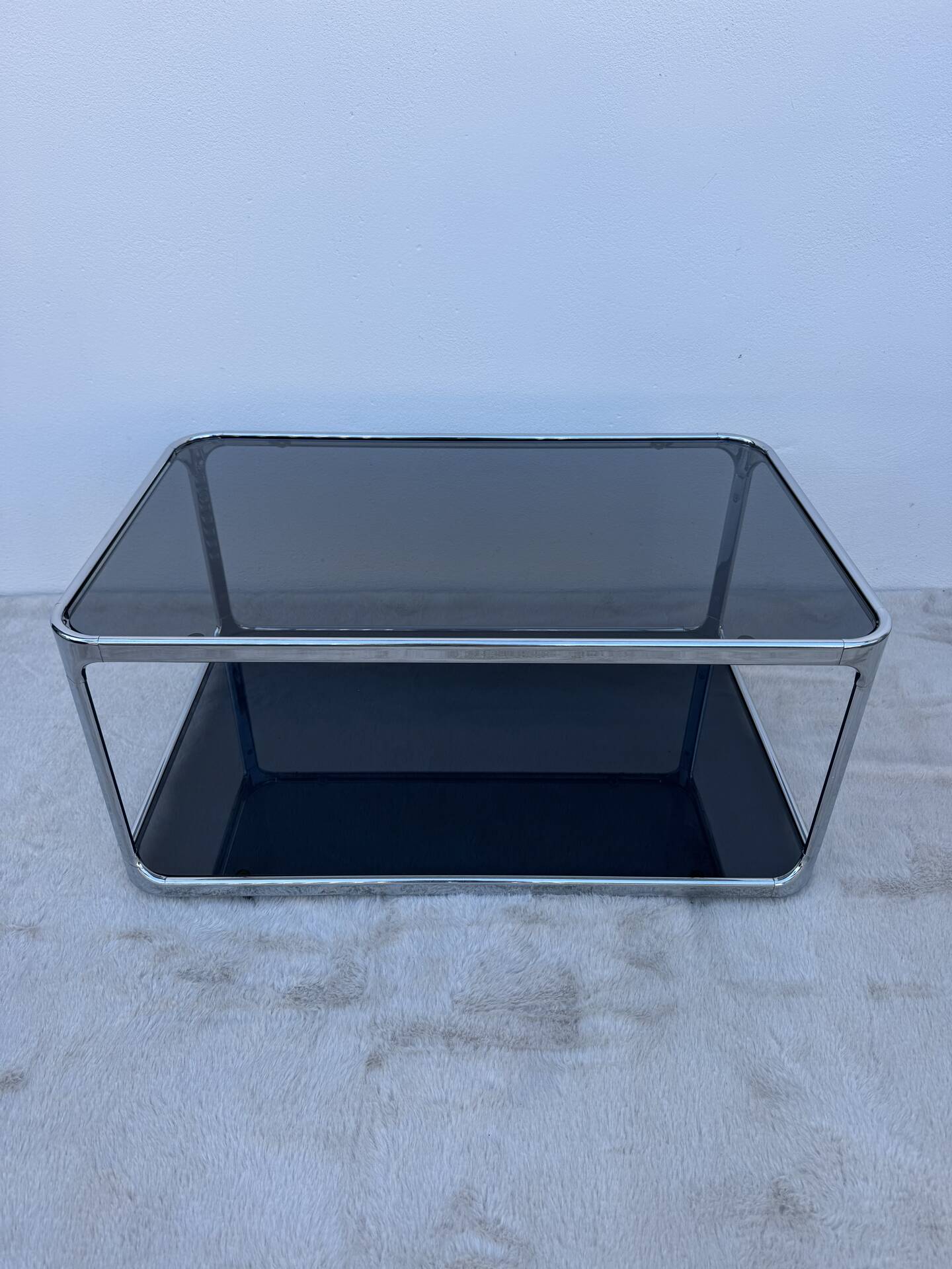Chrome and smoked glass coffee table from the 1970s.