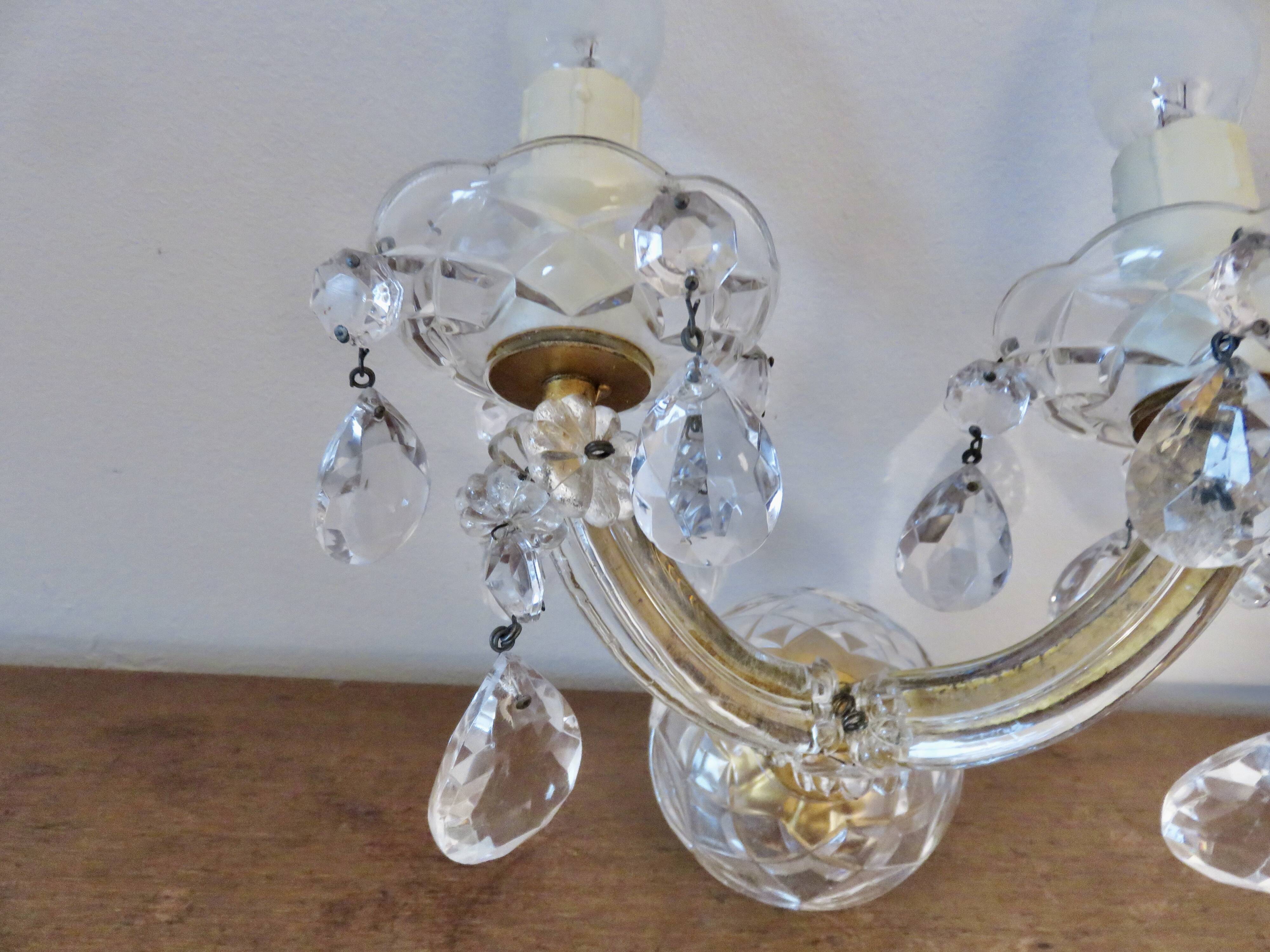 pair of double wall sconces with crystal pendants, made in Italy