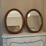 Pair of antique oval mirrors