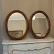 Paire de miroirs anciens ovales
