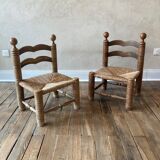 Suite of two low chairs in wood and straw 1960