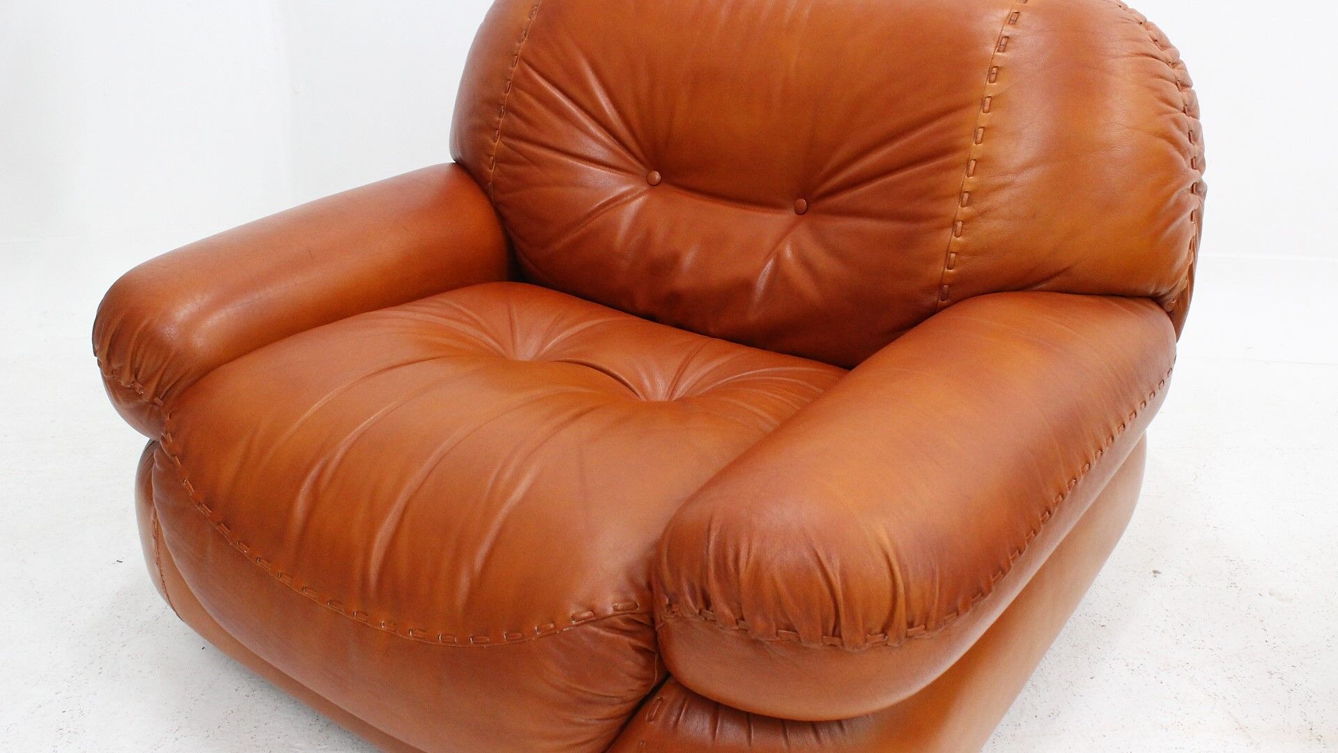 Sapporo cognac leather armchairs by Girgi 1970s