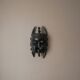 Decorative mask hand carved in tribal ethnic painted wood