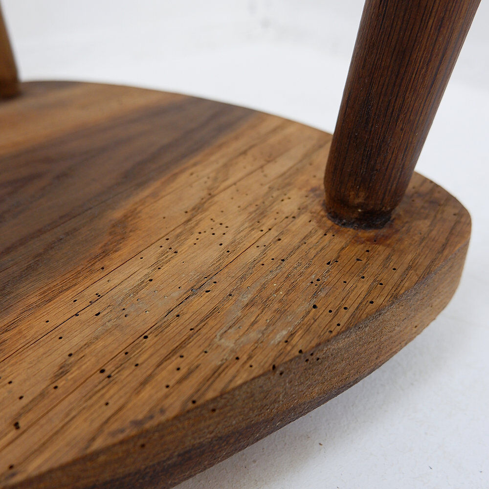 Rustic tripod stool with a triangular seat, 1960s.