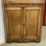 19th-century English corner cabinet in oak, mahogany, and fir.
