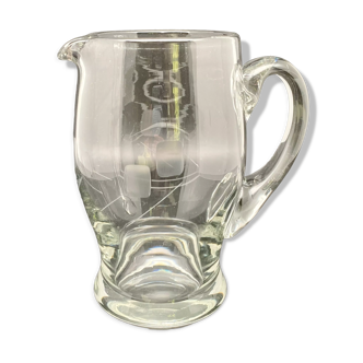 Patterned pitcher in worked glass