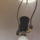 Large pagoda lamp painted with floral patterns and metal shade.