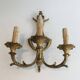 Pair of Louis XV style bronze wall sconces with 3 lights