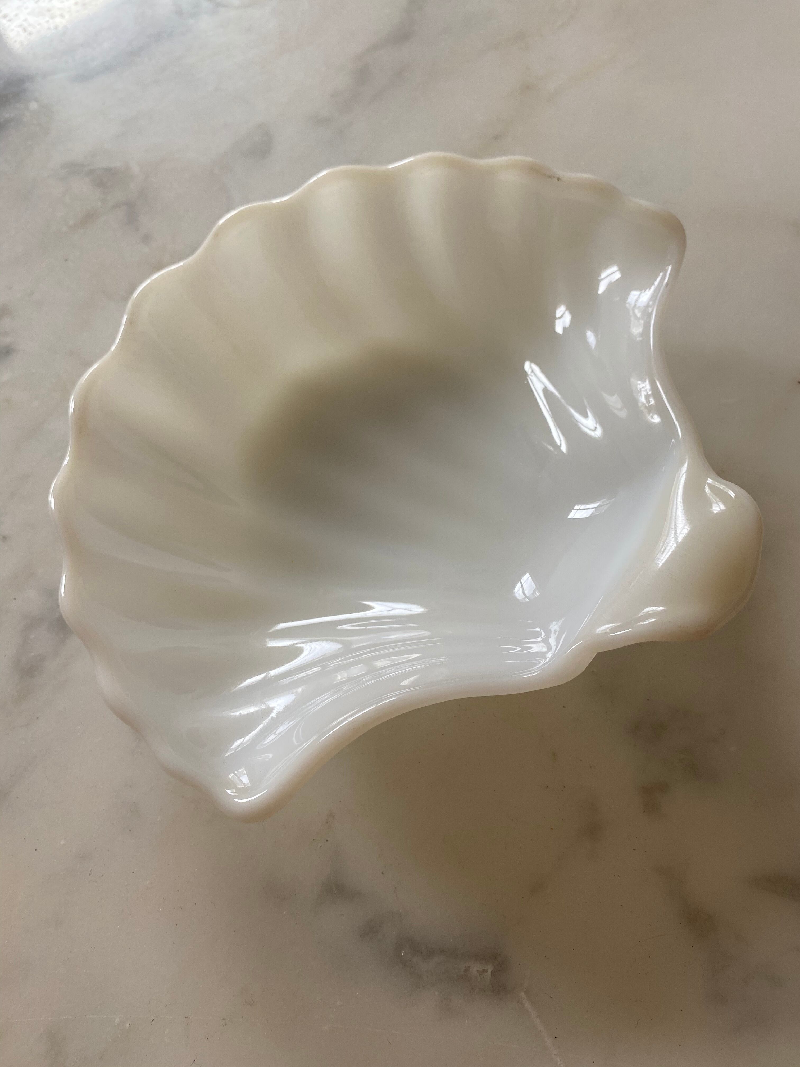 White opaline cup form shell