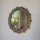 Brutalist round hammered gold metal mirror