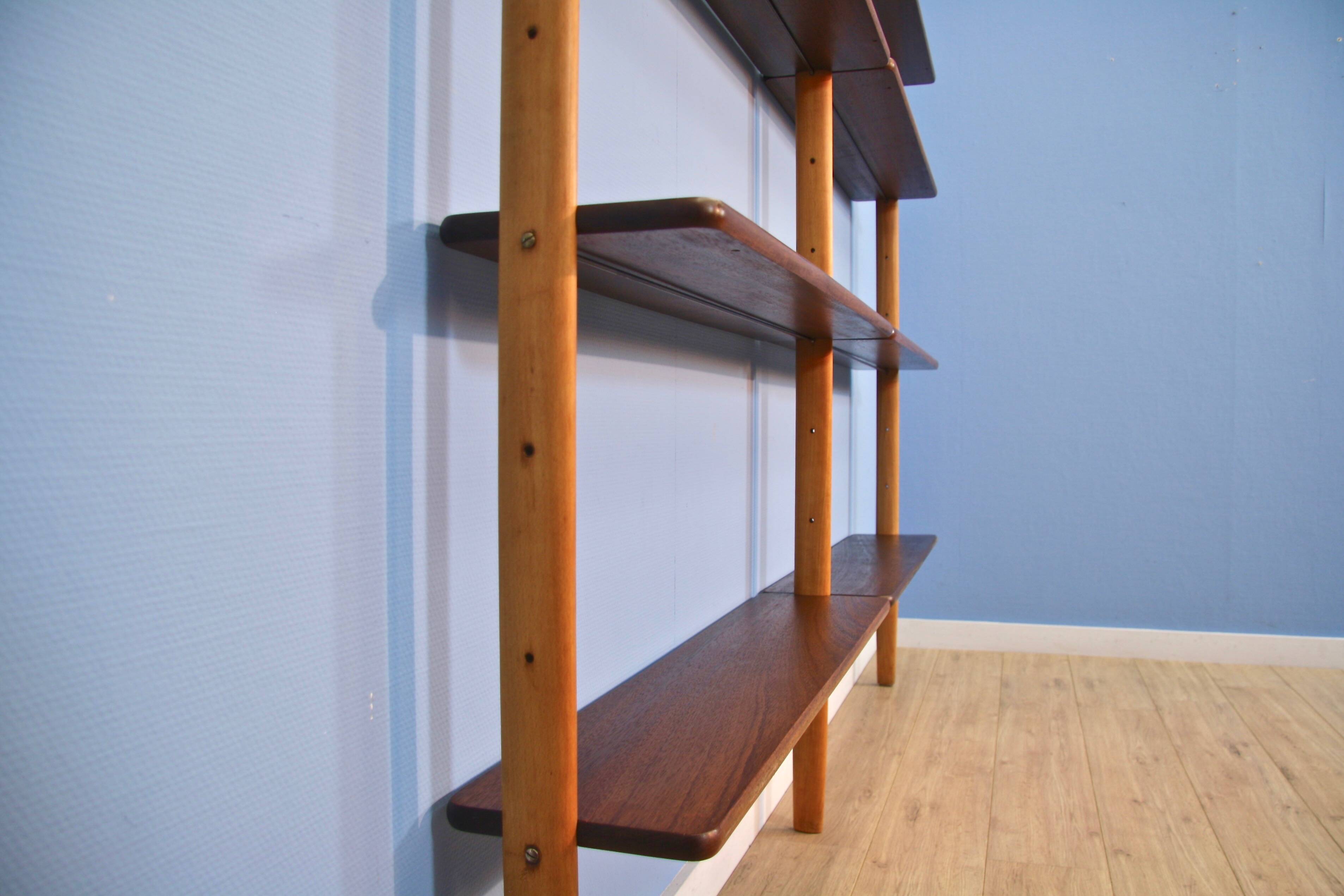 A Danish wall unit in teak and beech by William Watting for Scanflex, 1950s.