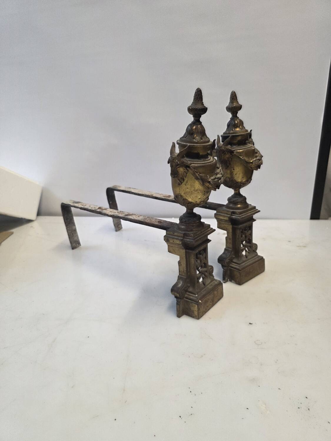 Pair of Louis XVI style andirons, 19th century in bronze