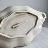 Tray, old dish with handles and relief patterns.