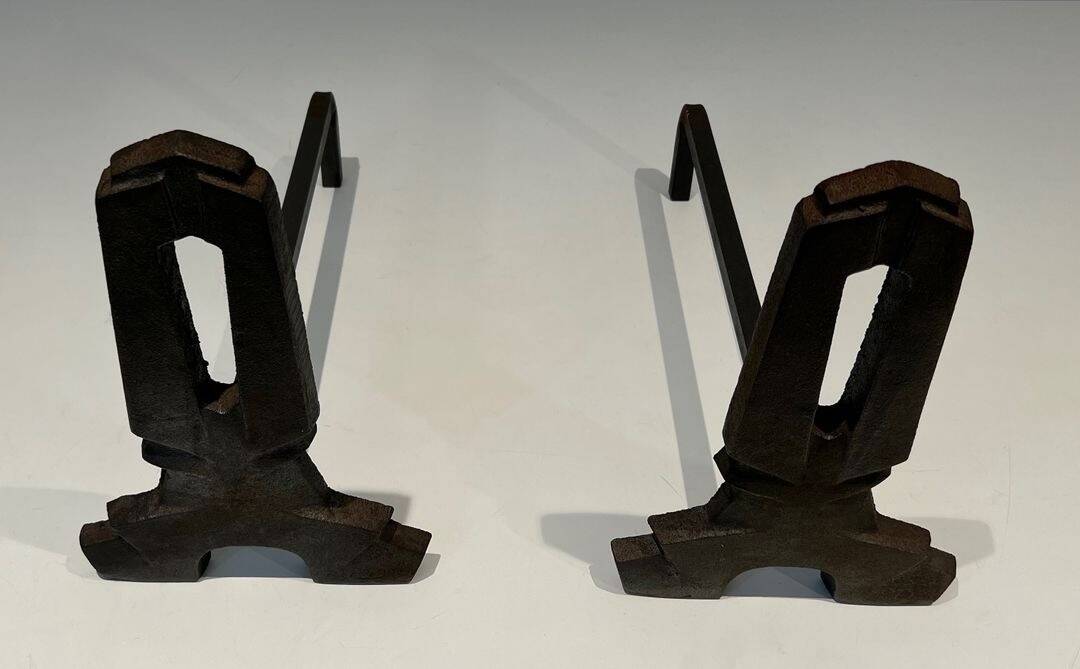 Pair of Modernist Andirons in Cast Iron with Openwork Uprights and Tripod Bases