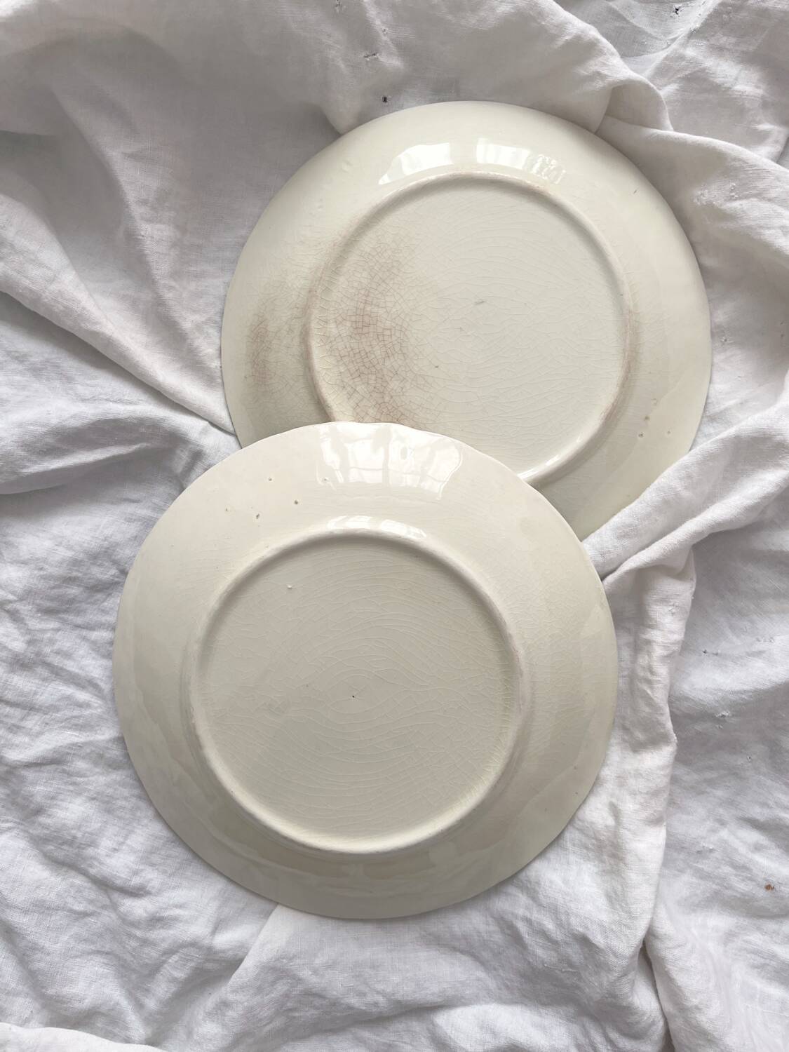 2 old slip plates decorated with roses