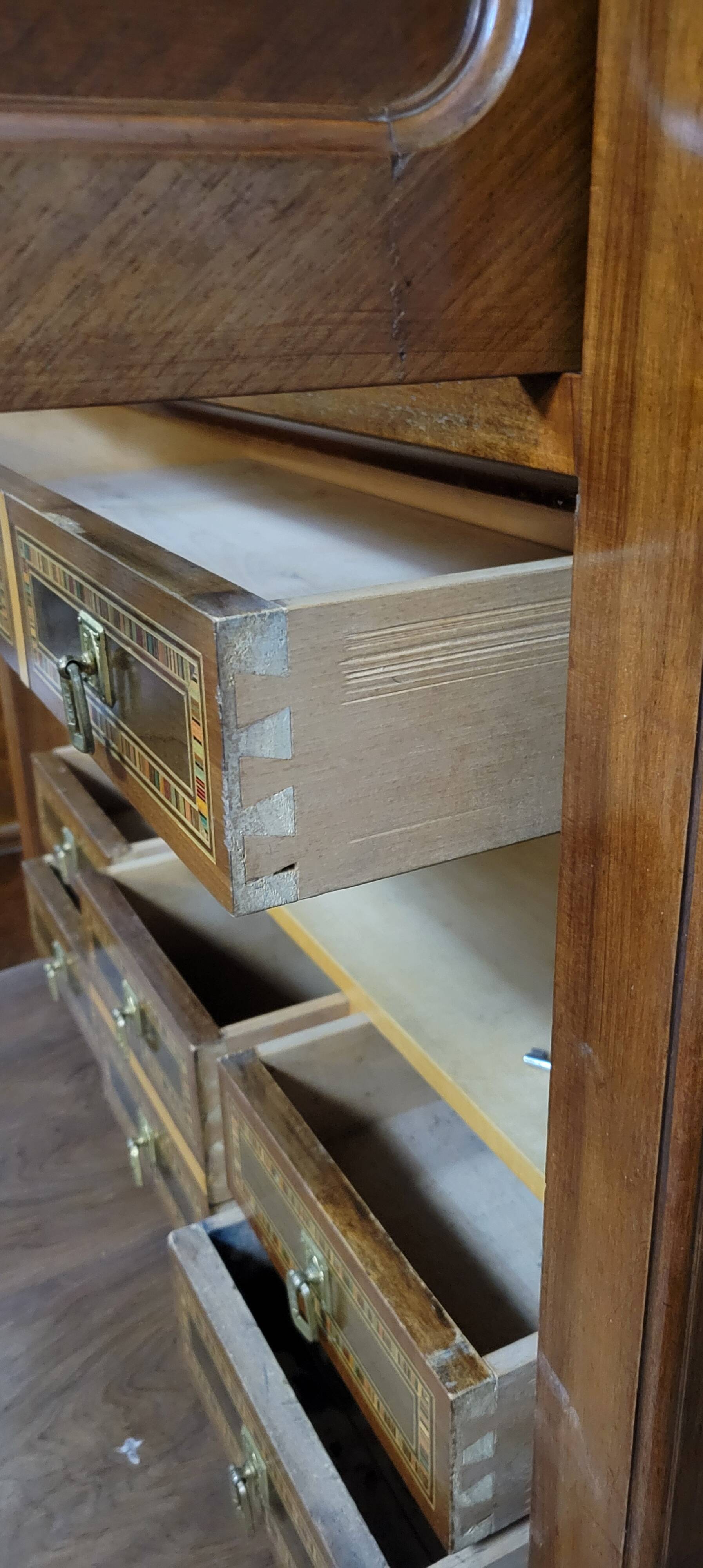 Rare Biedermeier guillotine secretary, made of walnut and marquetry.
