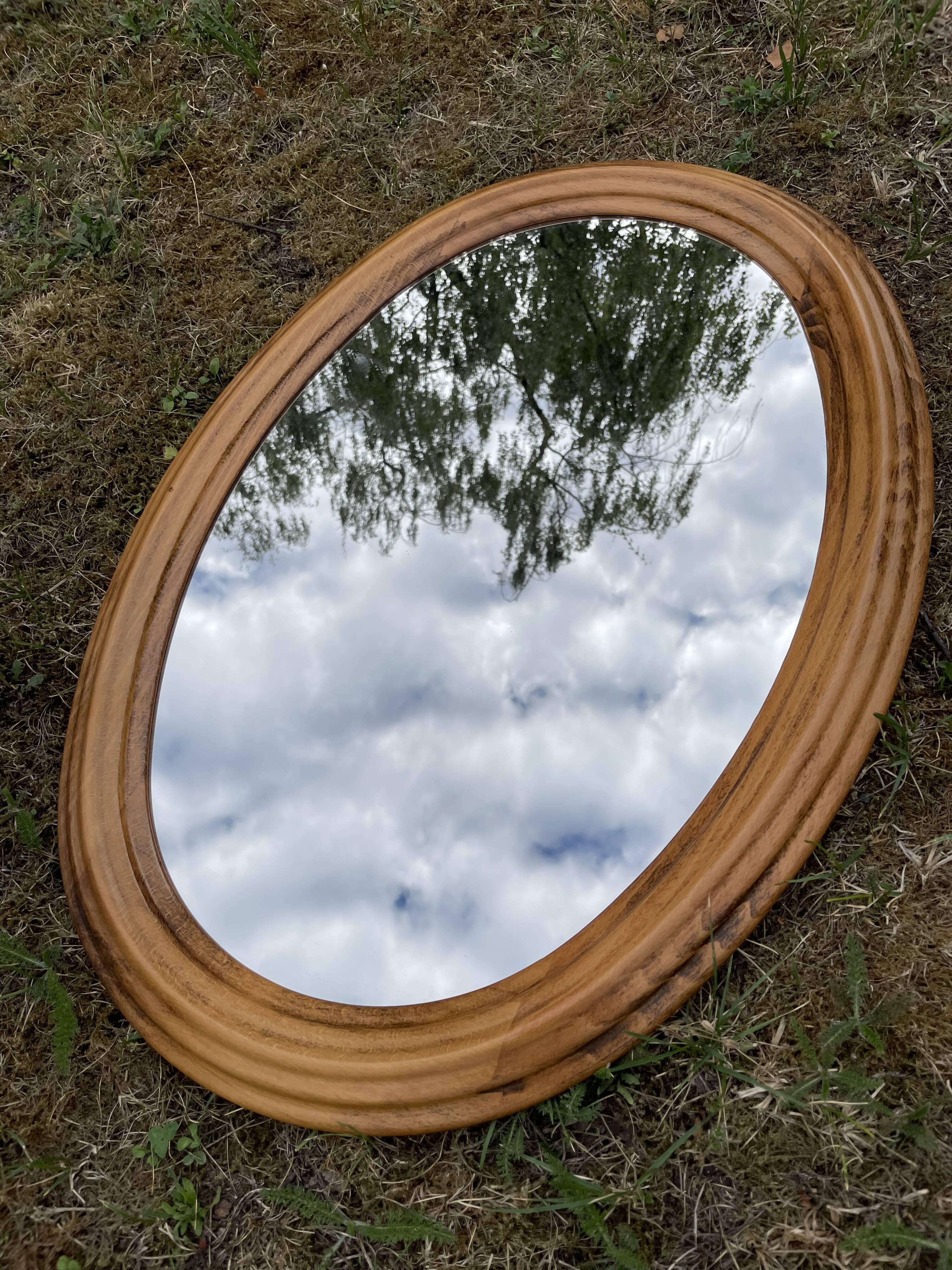 Oval wooden mirror 46x72cm