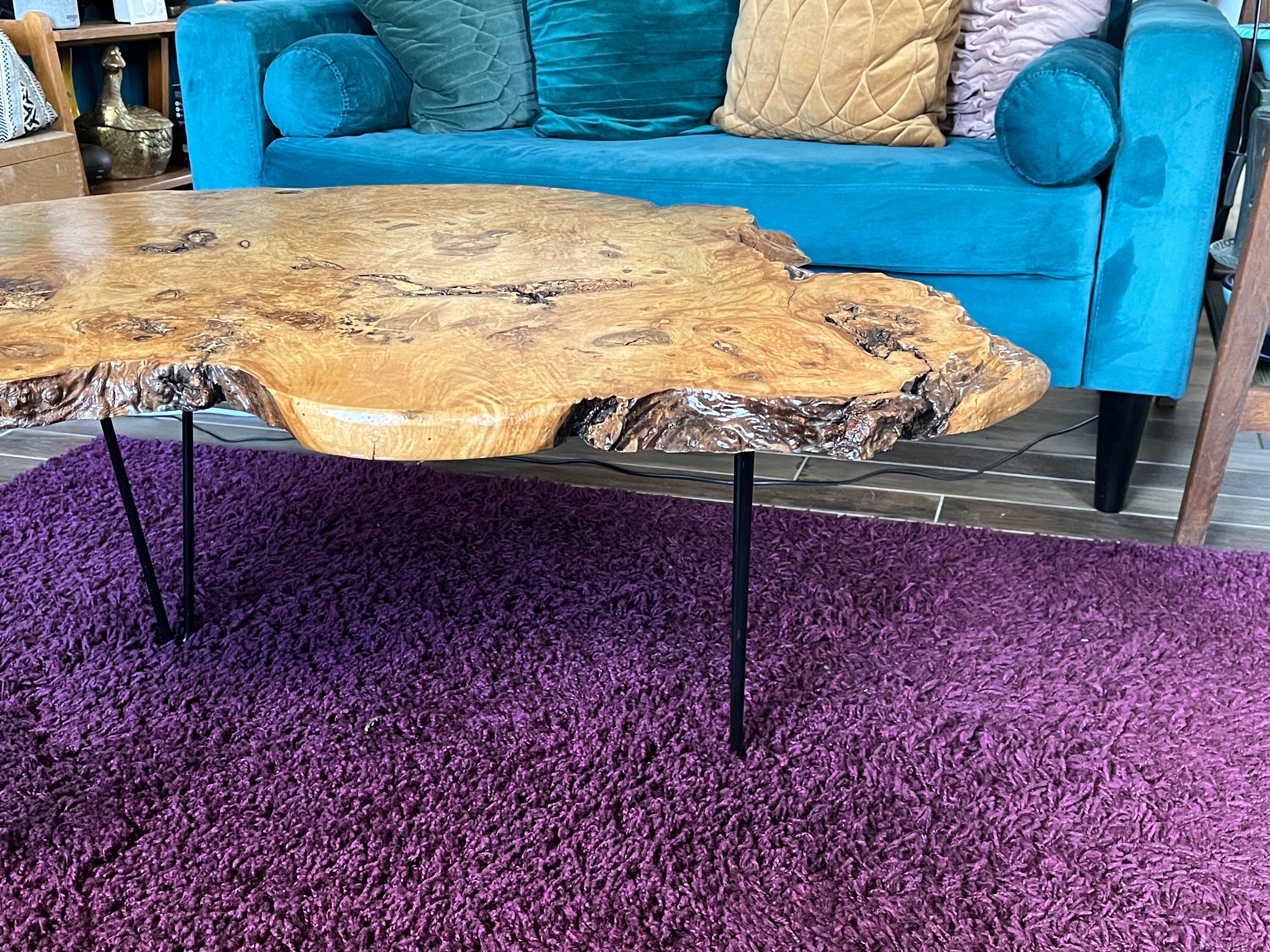 Tripod coffee table in natural solid elm magnifying glass