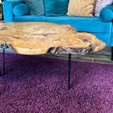 Tripod coffee table in natural solid elm magnifying glass