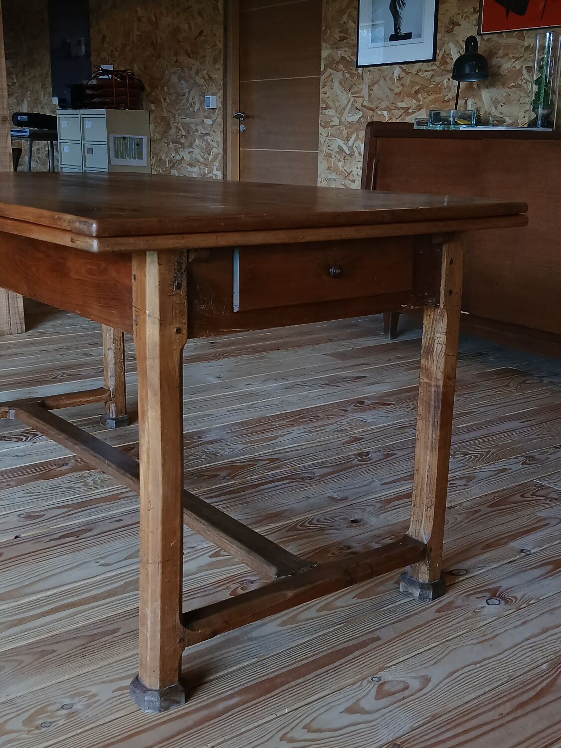 Elm farmhouse table with extensions for 6 to 10 people.