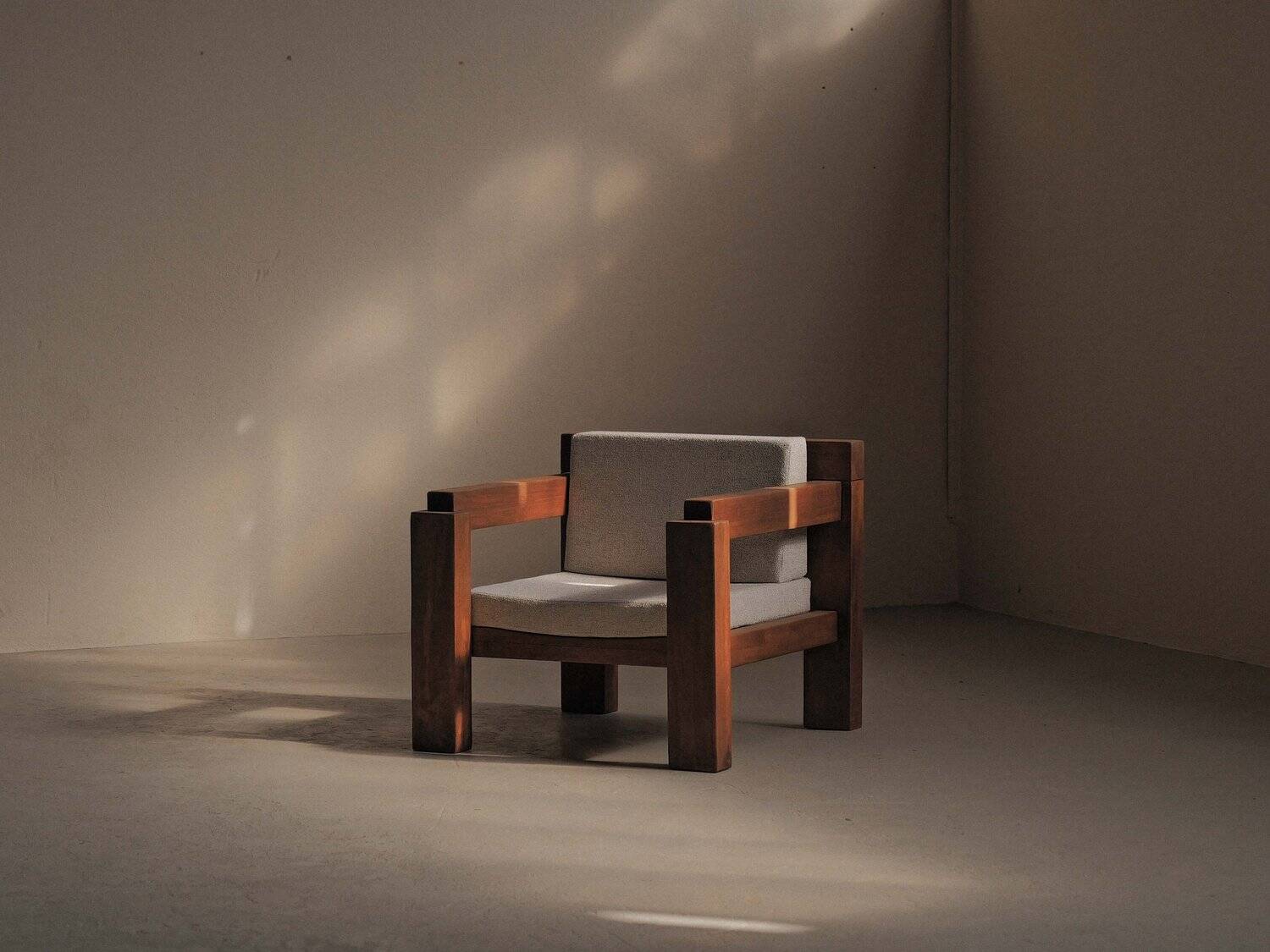 Handcrafted armchair in solid wood and fabric, 1980s-90s.