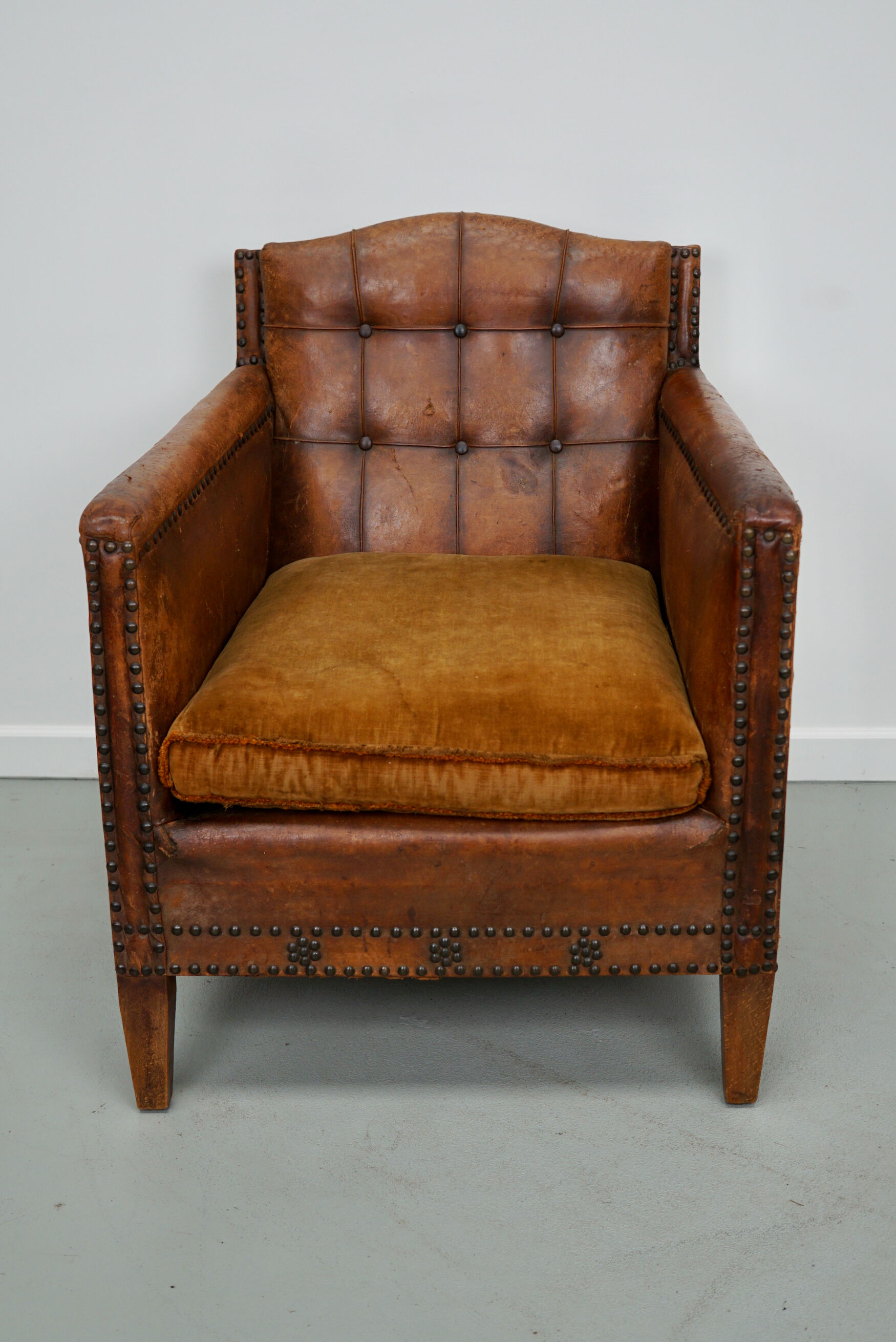 French cognac leather buttoned back club chair