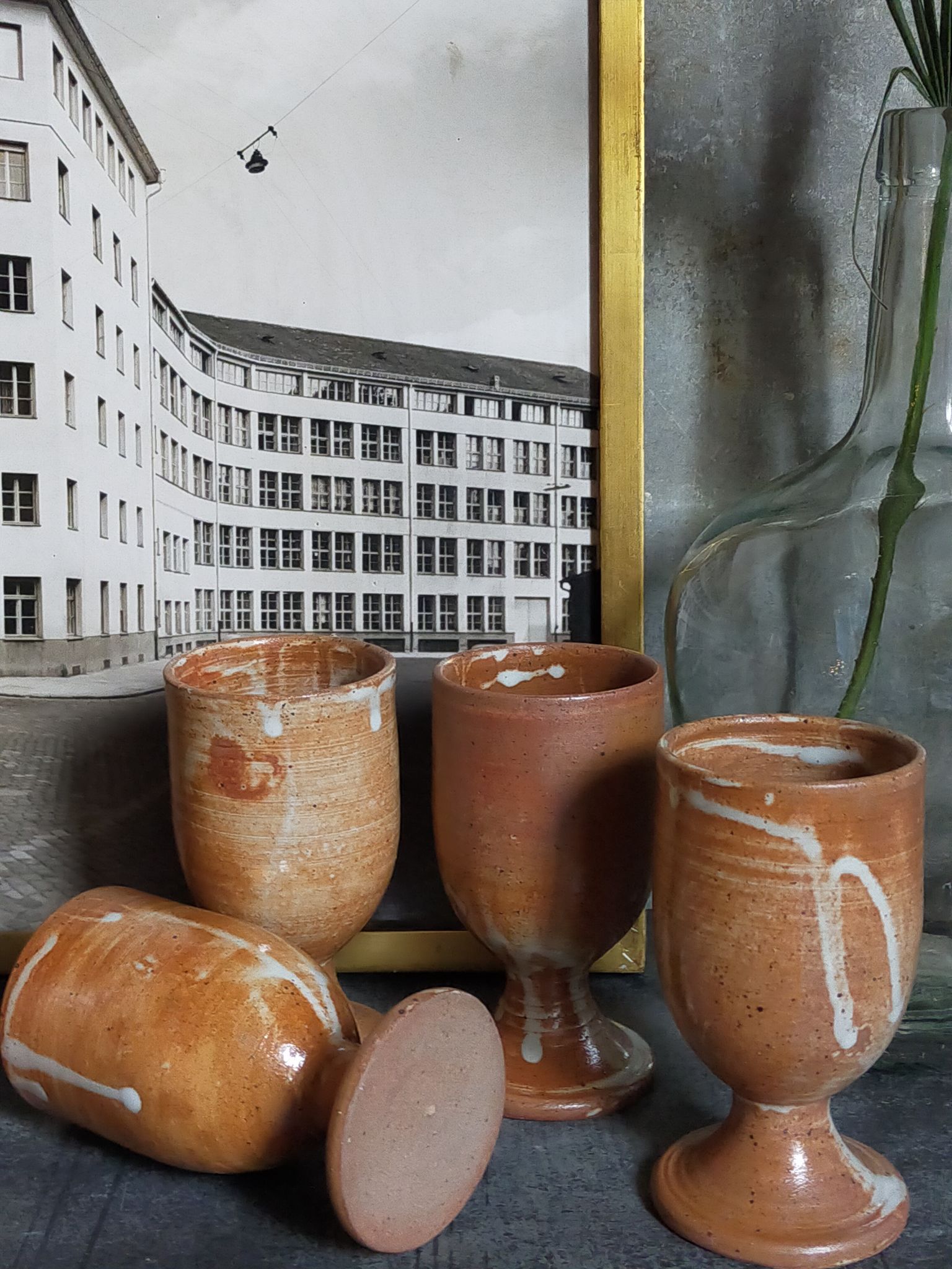 Four potter's mugs turned in vintage light stoneware