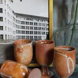 Four potter's mugs turned in vintage light stoneware