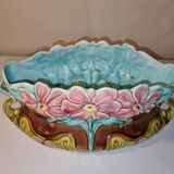 Old barbotine planter with flower patterns