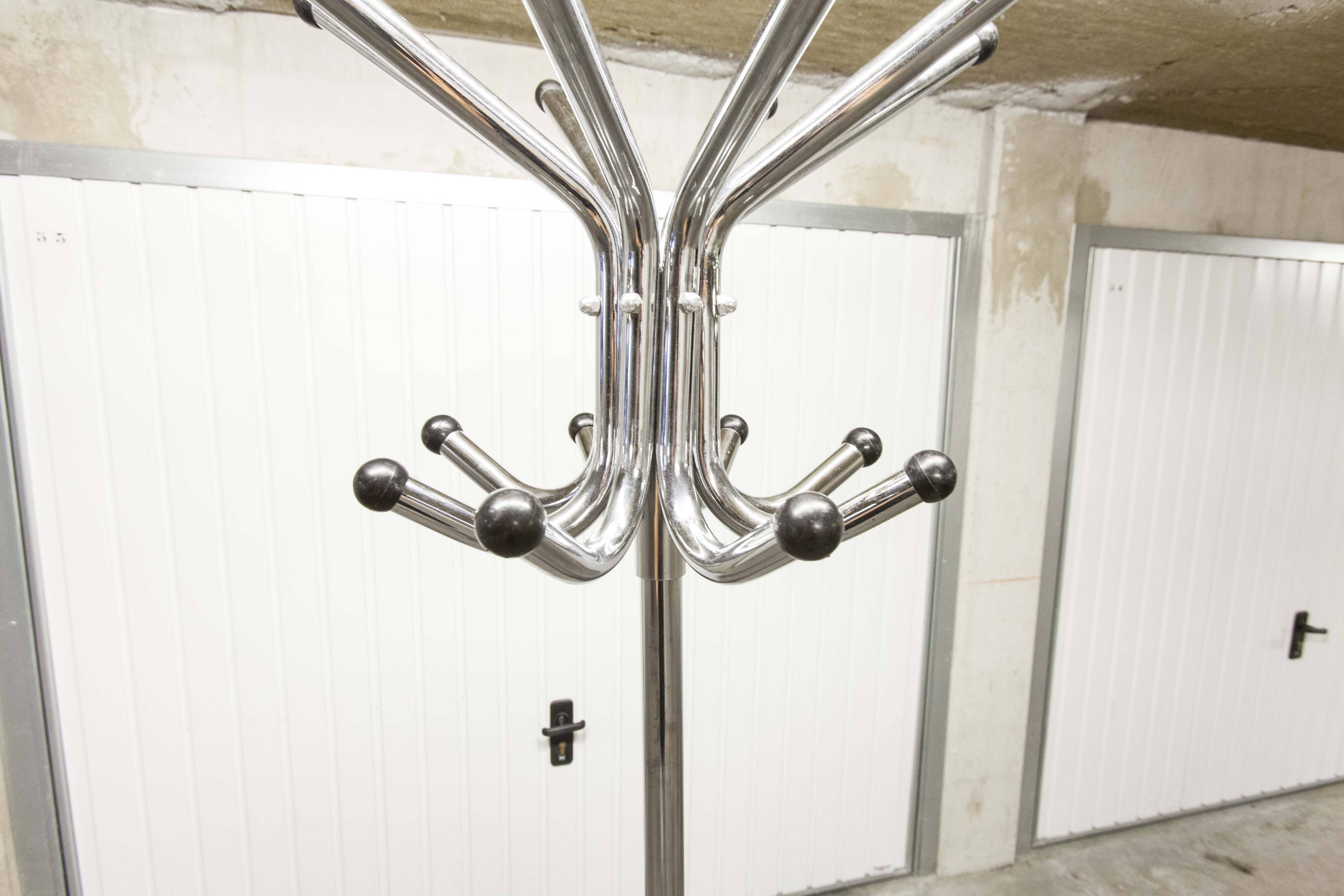 1960 parrot coat rack with 16 hooks, industrial chrome metal, rotating.