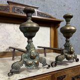 Pair of Louis XIV period andirons in gilded bronze circa 1700